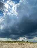 Fototapeta  - Storm rolls into Massachusetts beach on a humid summer day