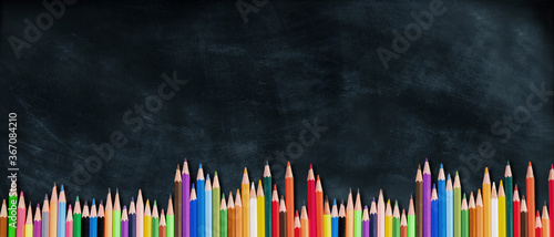 Cuadros en Lienzo back to school concept. stationery items on blackboard