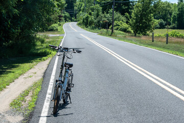 Poster - Electric bike on on a country road