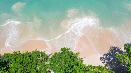 Wall Mural - Aerial view landscape of beautiful tropical beach, top view from drone, Aerial view of sandy beach and ocean with waves with palms on the sandy beach, Ao Nang, Krabi, Thailand.