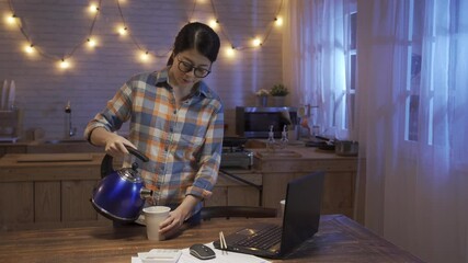 Wall Mural - elegant asian japanese woman in glasses walking and hold kettle. hungry and lazy female pouring boiling water on instant noodles ready for late night snack in home kitchen. girl with teapot cooking