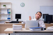 © Elnur - Young male employee unhappy with excessive work