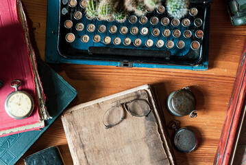 
still life with vintage accessories on the writing desk