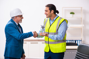 Wall Mural - Two male architects working in the office