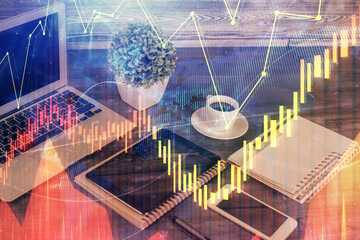 Double exposure of financial graph drawing and cell phone background. Concept of forex trading