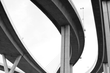 a part of elevated expressway in black and white