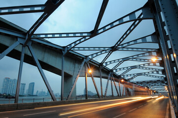 metal bridge on the street at twilight