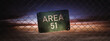  Area 51 sign on a fence at dusk. (3D Rendering, illustration)