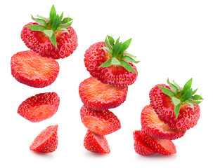 Wall Mural - Strawberry slices isolate. Falling strawberry slices. Strawberry slice on white. Falling, flying berries.