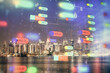 © peshkova - Data theme hologram drawing on city view with skyscrapers background multi exposure. Ai concept.