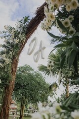 Canvas Print - Beautiful vertical shot of a decorated arch in an open-air wedding reception