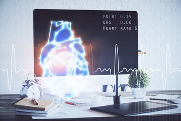 Desktop computer background and heart drawing. Double exposure. Medical study and healthcare concept.