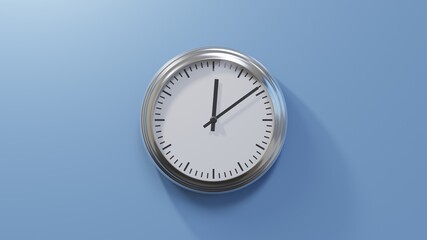 Wall Mural - Glossy chrome clock on a blue wall at nine past twelve. Time is 00:09 or 12:09