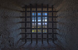 Fototapeta Krajobraz - old prison window, vista desde prisión en castillo antiguo