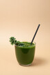 Green vegetable juice or kale smoothie. Homemade healthy drink. Copy space