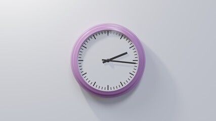 Glossy pink clock on a white wall at sixteen past two. Time is 02:16 or 14:16