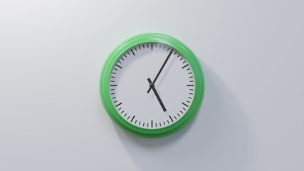 Wall Mural - Glossy green clock on a white wall at five past five. Time is 05:05 or 17:05