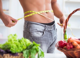 Young man in healthy eating and dieting concept