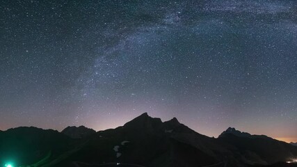 Wall Mural - milky way arc and stars in night sky over the alps. outstanding comet neowise glowing at the horizon
