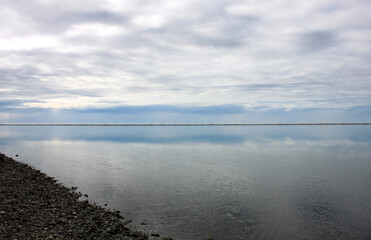 Wall Mural - Pristine water scenes with reflections and brilliant blue skies