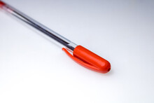 Plastic Pen, Red, In A Transverse Position, On A White Background
