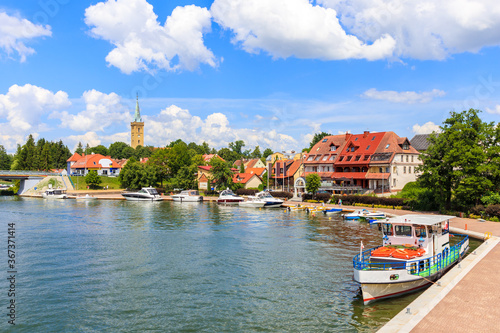 Tourist ship in Mikolajki port on sunny summer day, Mazury Lake District, Poland