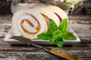 Wall Mural - Slices of homemade sweet roll with fruit jam.