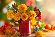 Autumn Floral Still Life With Beautiful Yellow Dahlia In Vintage Red Jug And Pumpkins On The Table. Autumnal Festive Concept.