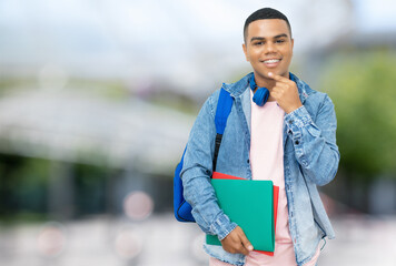 Wall Mural - Smiling brazilian male student with braces