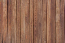 Rich Colored Clean Dark Wooden Vertical Panel Slats Background With Even Lighting.