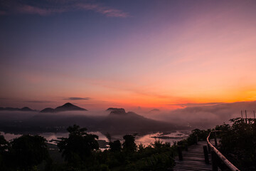 Wall Mural - morning mist on the mountains along the mekong river