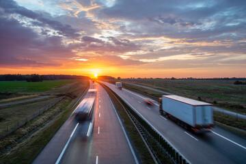 Wall Mural - heavy traffic on the highway during sunset