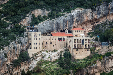 Canvas Print - Distance view of the monastery of Our Lady of Hamatoura near Kousba village in Lebanon