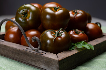 Fresh ripe sweet reddish brown and green kumato tomatoes