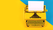 © svitlini - Yellow bright typewriter on a yellow background. Creativity concept