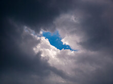 A Piece Of Blue Sky In A Hole In The Thick Rain Clouds