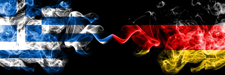 Wall Mural - Greece vs Germany, German smoky mystic flags placed side by side. Thick colored silky abstract smoke flags.