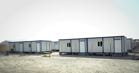 Portacabin, porta cabin, temporary labours camp , Mobile building in industrial site or office container Portable house and office cabins. Labor Camp. Porta cabin. small temporary houses