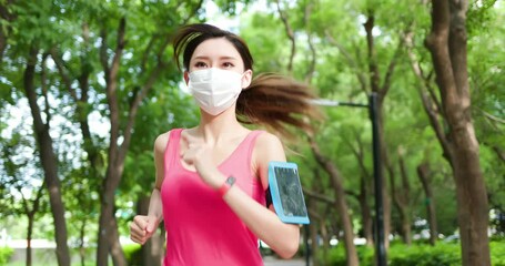 Wall Mural - sport woman running with mask