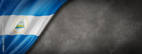 Fotografía Nicaragua flag on concrete wall banner