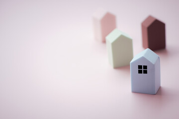 Wall Mural - House model on color background. Real estate, buying a house, new home, house concept copy space
