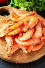 shrimp cooked seafood ready to eat prawn serving size. food background top view copy space healthy eating raw pescetarian 