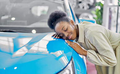 young attractive afro woman enjoy being owner of new auto, business lady make purchase in dealership