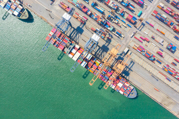 Container , container ship in export and import business and logistics. Shipping cargo to harbor by crane. Water transport International. Aerial view and top view.