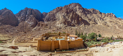 A panorama view of Mount Sinai with Saint Catherine's Monastery at the foot of the mountain in Egypt in summer