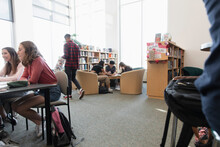 High School Students Studying In Library