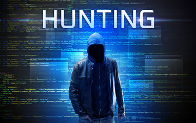 Wall Mural - Faceless hacker with HUNTING inscription on a binary code background