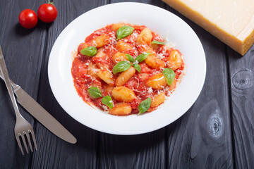 Canvas Print - Italian homemade potatoes gnocchi with tomatoes sauce