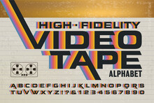 A Retro Alphabet With 1980s Style Rainbow Effects. High-Fidelity Videotape Packaging Font With Colorful Stripes On A Video Cassette Box.