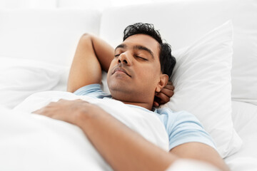 Sticker - people, bedtime and rest concept - indian man sleeping in bed at home